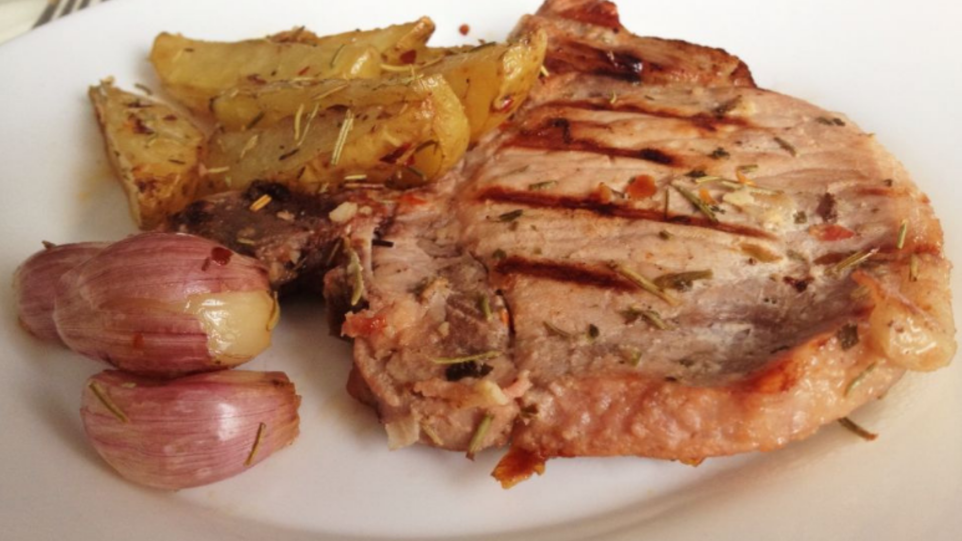 Bisteca de Porco com Suco de Laranja Feita no Forno